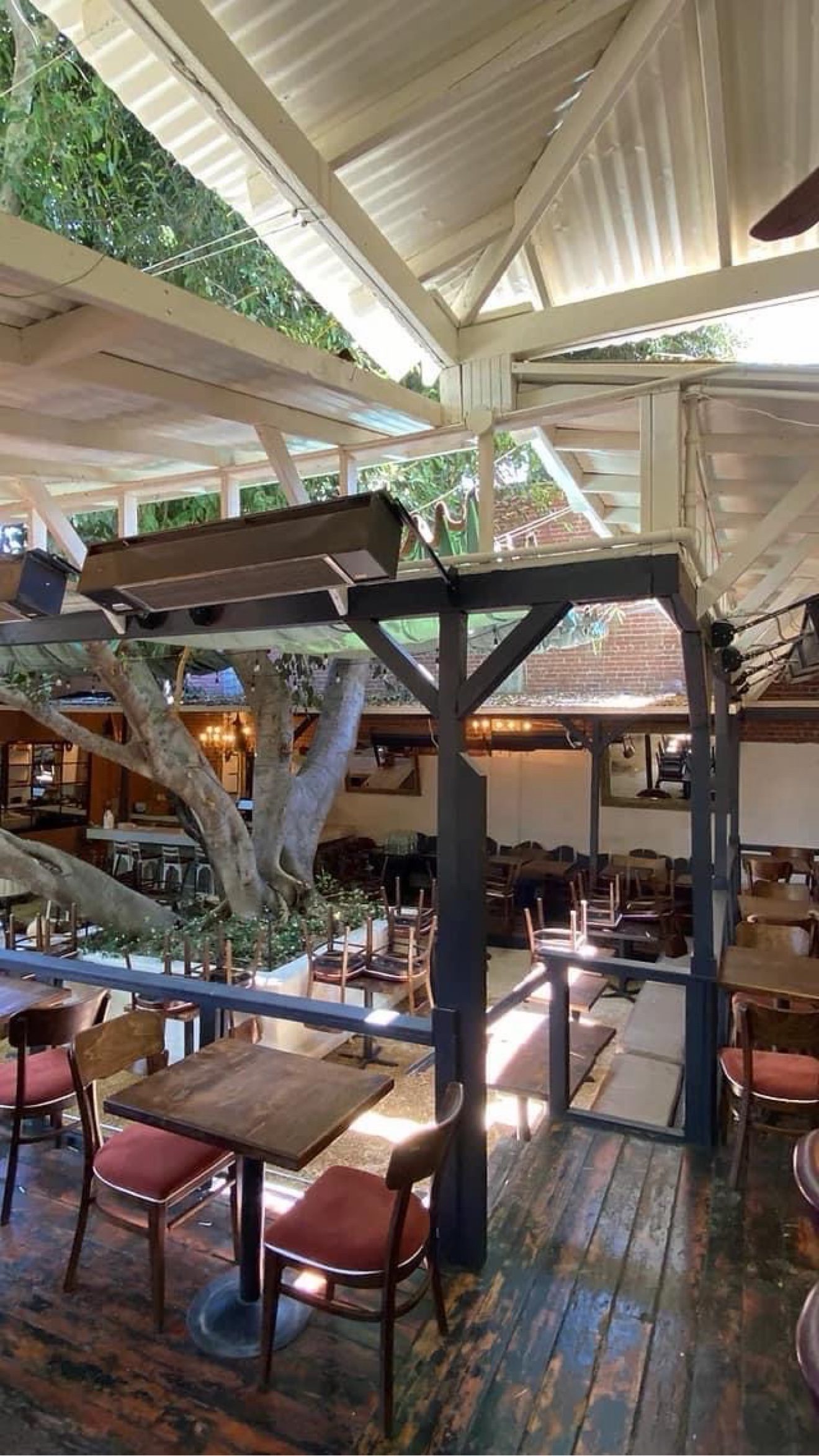 Sunpak wall-mounted patio heaters on a restaurant exterior